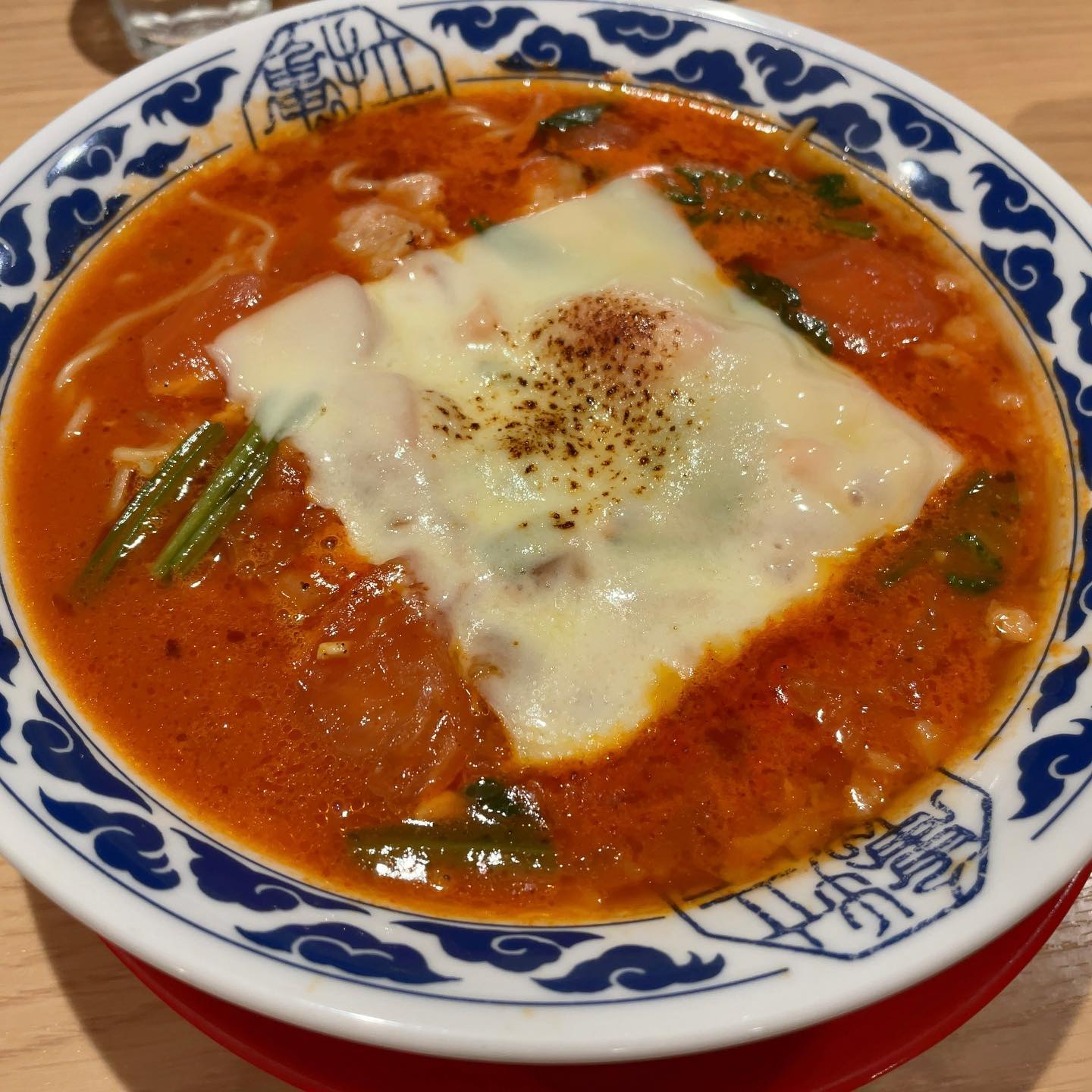 らーめん亀王JR新大阪駅店「チーズトマトらーめん」の投稿写真 2